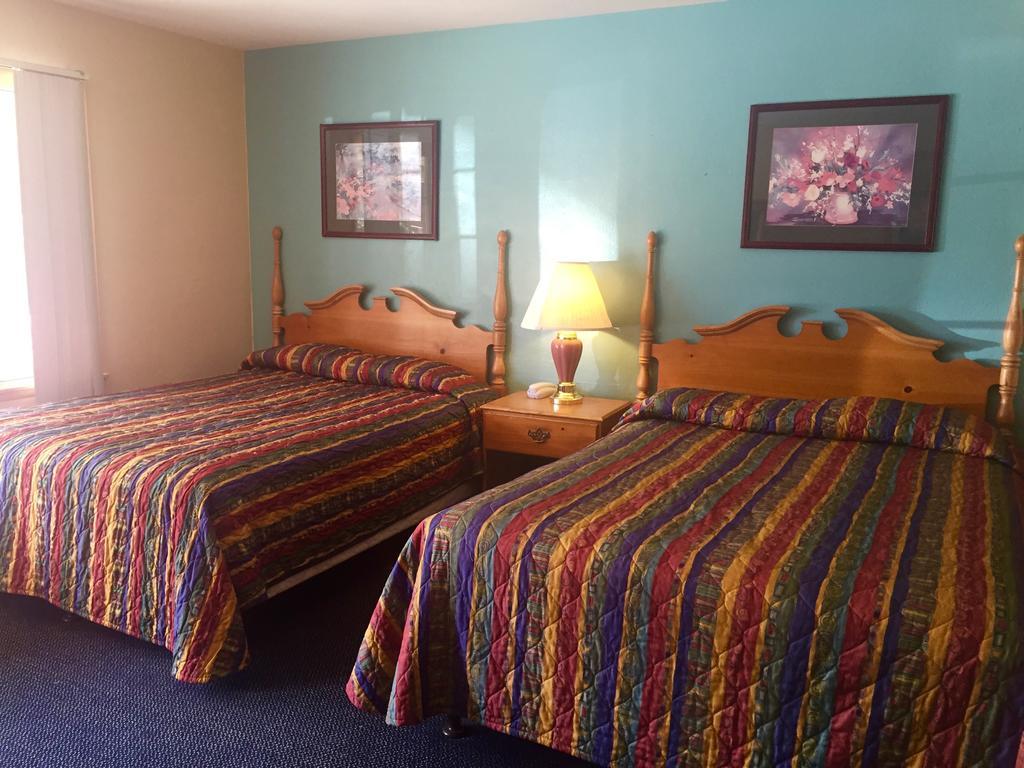 Paradise Inn Стая снимка