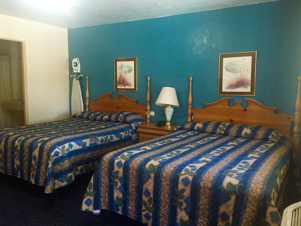 Paradise Inn Стая снимка